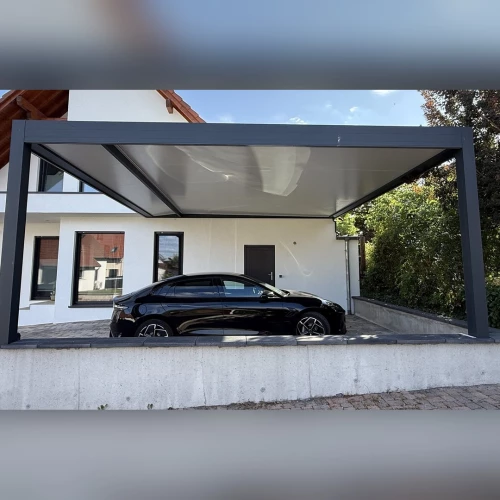 Carport aluminium Carisma deux places sur mur de soutènement à Munchhausen – BH Solutions