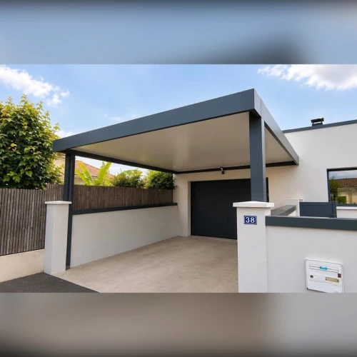 Carport aluminium anthracite devant un garage à Haguenau – BH Solutions